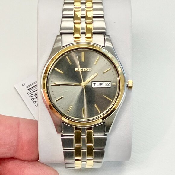 Seiko Two Tone Stainless Steel Watch With Day And Date SUR432